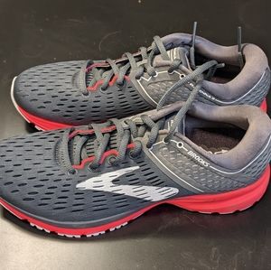Brand new Women's Brooks Ravenna running shoes. Black w/ neon coral sole. Size 9